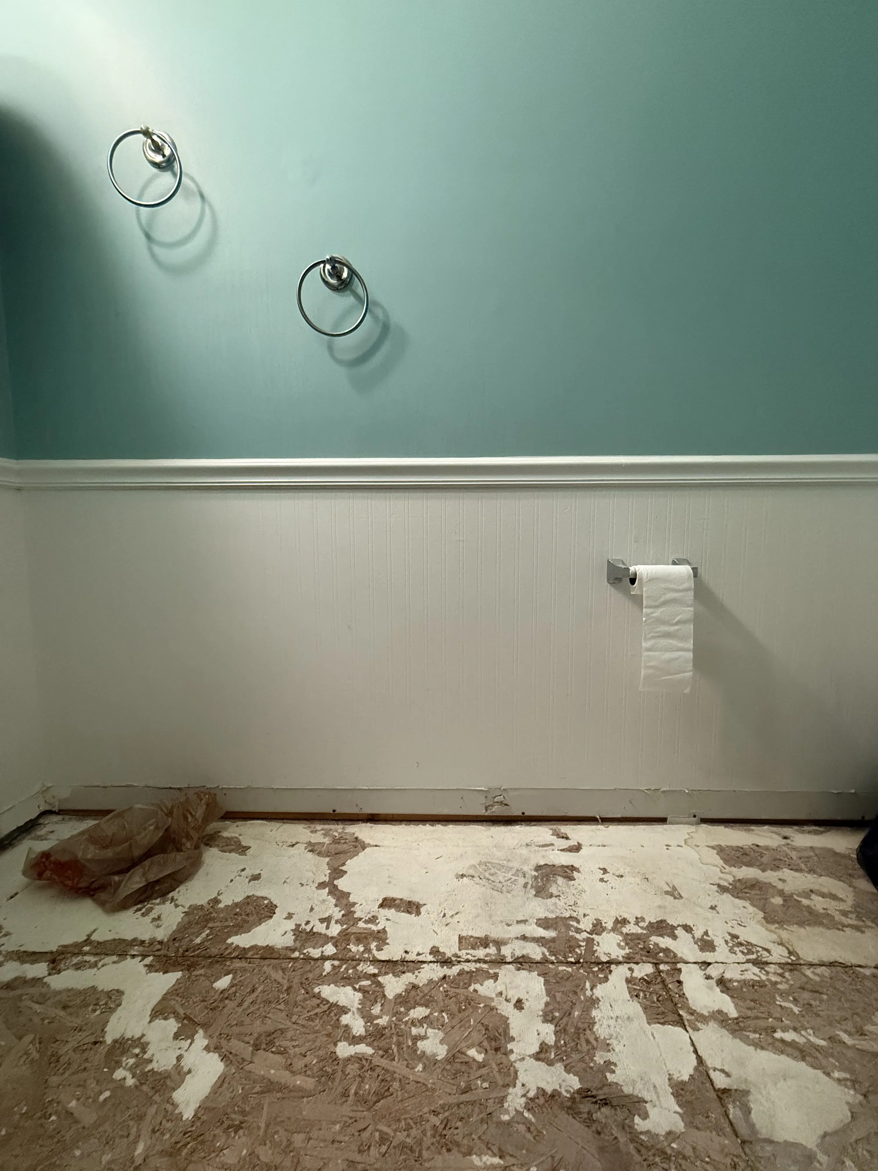 A bathroom stripped to the subfloor during a Carolina Pro Restoration water damage rebuild