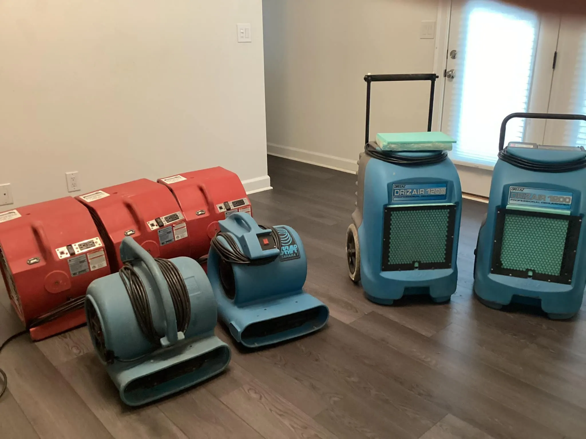 Commercial air movers and dehumidifiers drying a Fort Mill, SC home after water damage