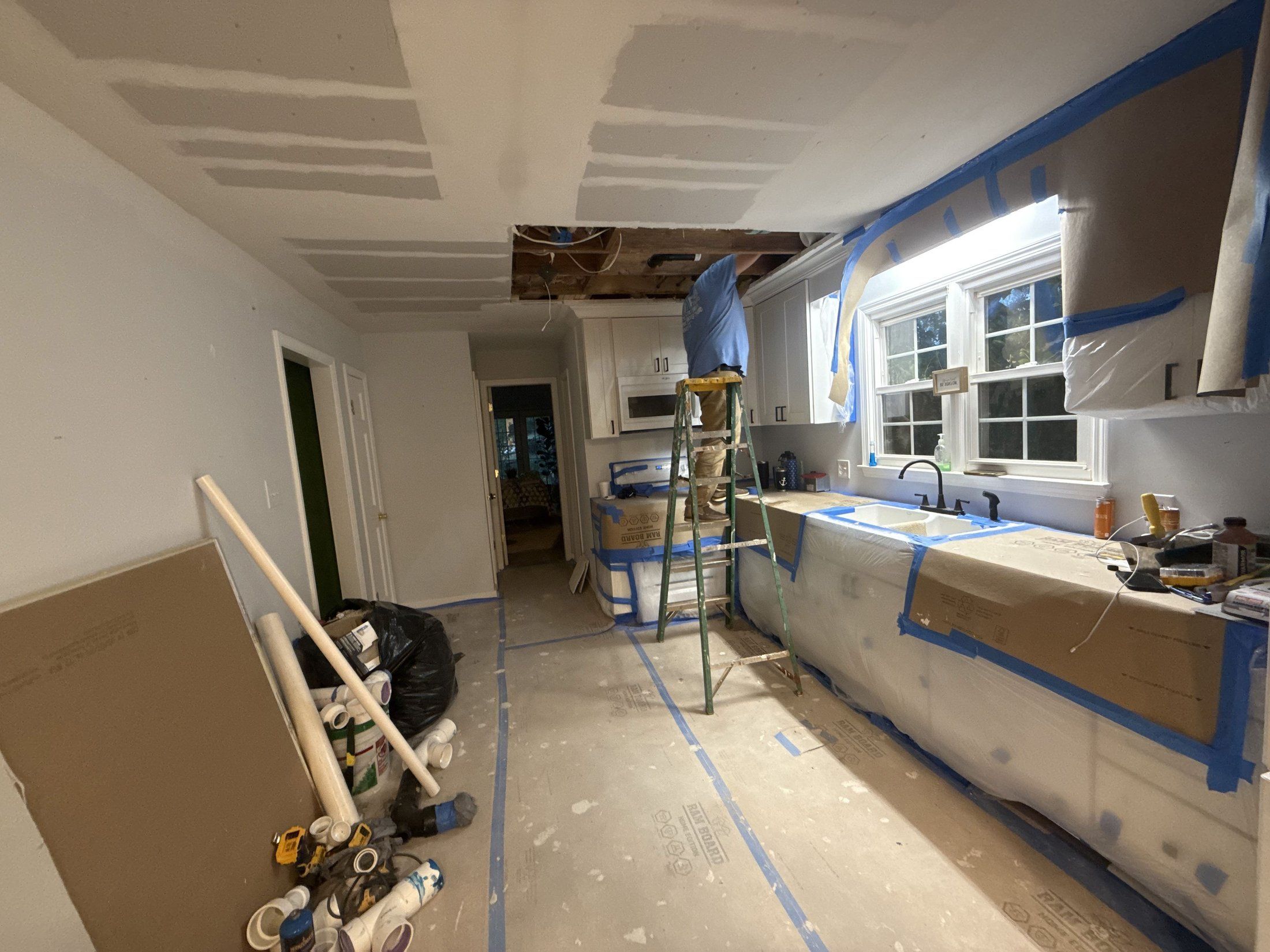 A kitchen gutted to the studs during a Carolina Pro Restoration reconstruction project