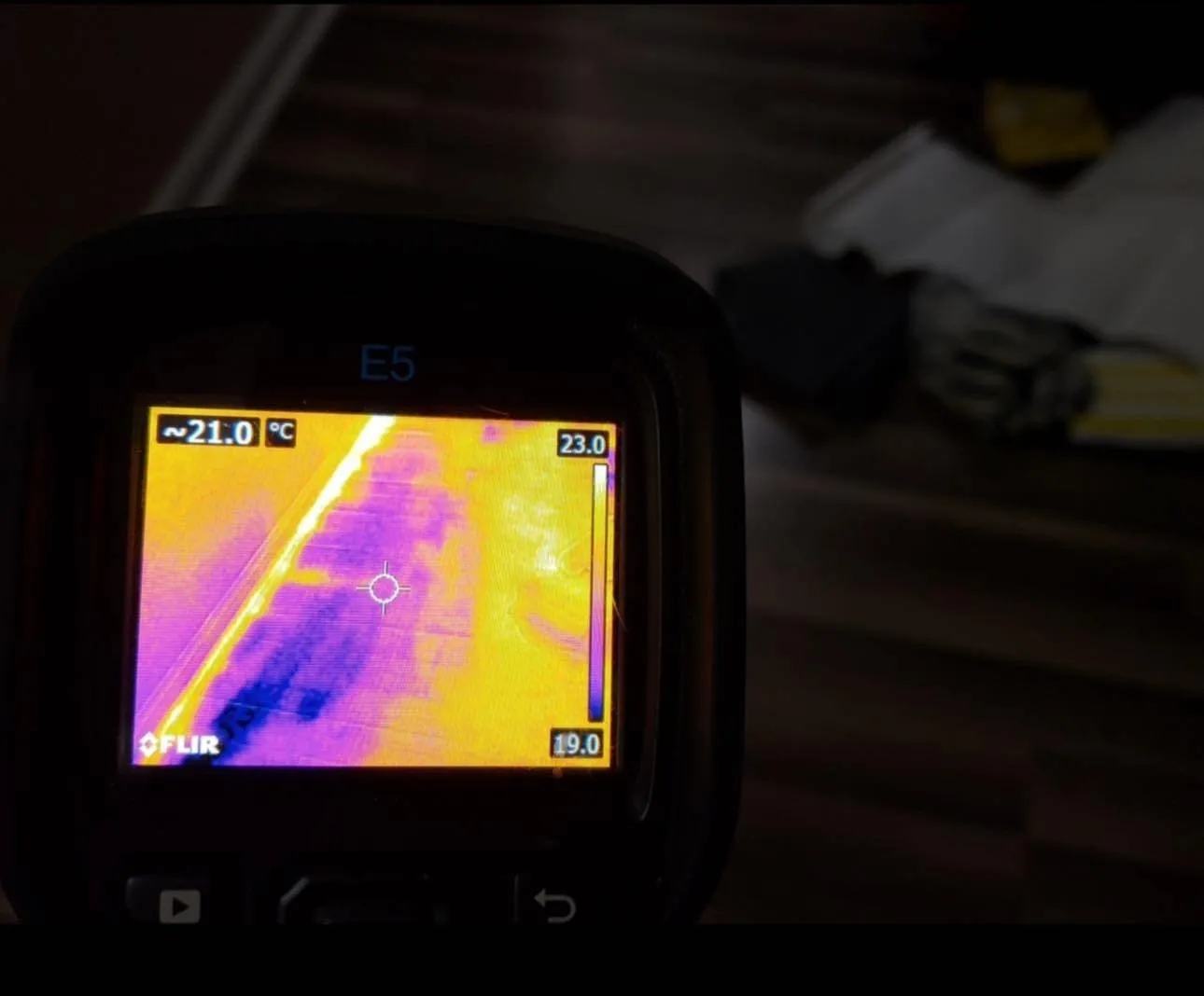 FLIR thermal imaging camera used by Carolina Pro Restoration to detect hidden moisture during a water damage inspection